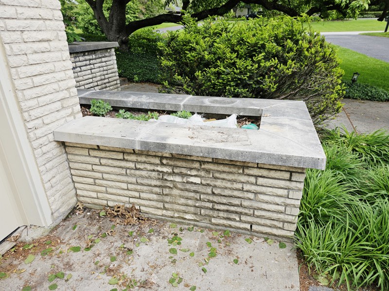 Stone surface exterior before cleaning service in Grand Rapids, Michigan